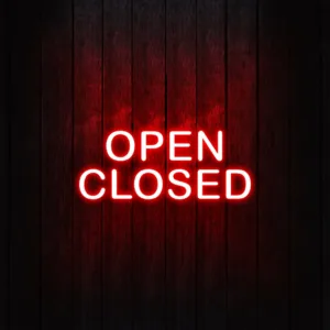 Closed neon sign, featuring a bold and glowing message to clearly indicate when a business or location is closed.