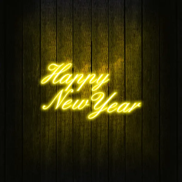 Colorful Happy New Year neon sign glowing with vibrant hues, creating a lively and festive atmosphere for New Year's Eve celebrations.