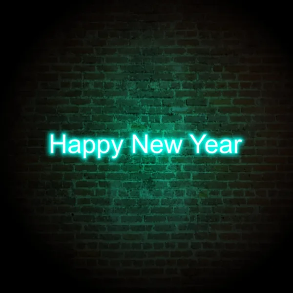 Vibrant Happy New Year neon signs glowing brightly, adding a lively and festive touch to New Year's Eve celebrations and decorations.