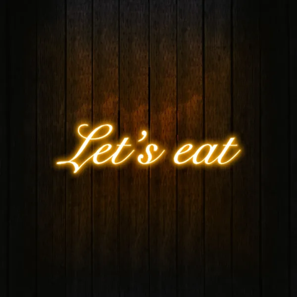Modern kitchen with a vibrant neon sign, creating a stylish and retro ambiance.