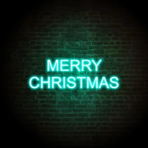 Vibrant Merry Christmas LED sign glowing brightly, adding a modern and festive touch to holiday decorations.