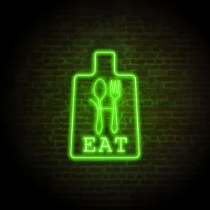 Vibrant neon sign illuminating a modern kitchen with a retro, stylish ambiance.