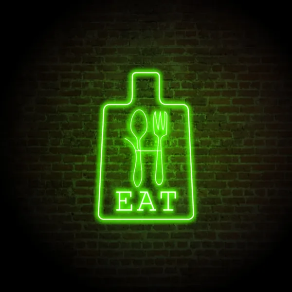 Vibrant neon sign illuminating a modern kitchen with a retro, stylish ambiance.