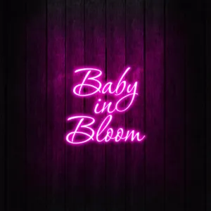 Personalized family name neon sign for outdoor use, custom-crafted to add a glowing and inviting touch to patios, gardens, or entryways.