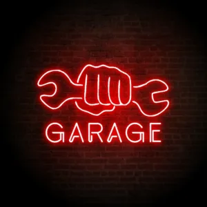 Bright neon garage signs glowing in vibrant colors, eye-catching signage perfect for garage doors, automotive businesses, or custom displays.