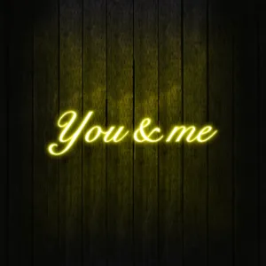 Neon wall clock glowing brightly in a modern room decor.